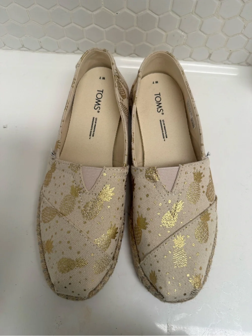 TOMS Cream Espadrille Slip-Ons with Metallic Gold Pineapple Motif